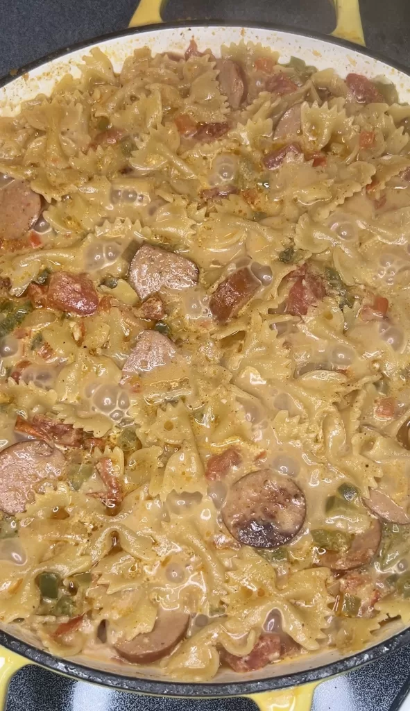 One Pot Cheesy Smoked Sausage with Bowtie Pasta - What's Mom Cookin'