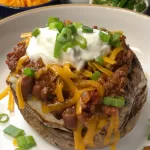 Chili cheese baked potatoes
